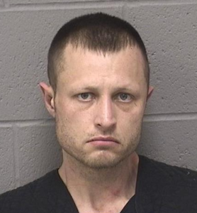 Arma man charged in fatal stabbing of wife