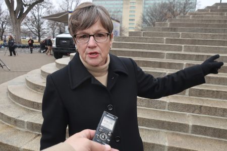 Kansas governor lauds abortion vote but focuses on economy