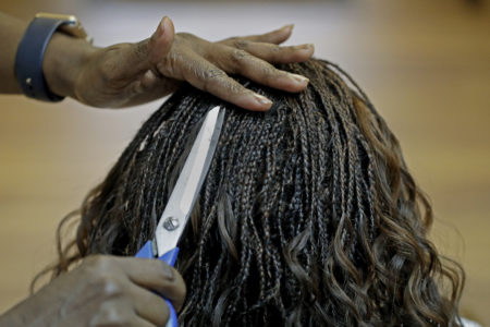 Cheerleading  coach in Kansas resigns over “hairy” problem