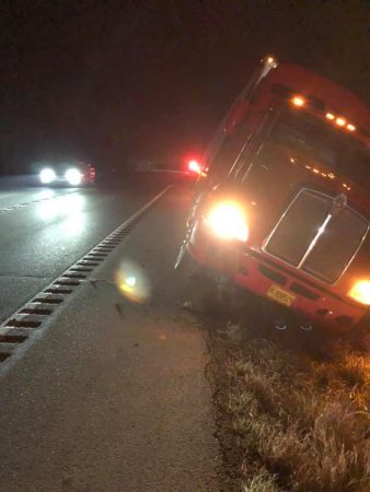 tractor trailer in ditch, Newstalk KZRG