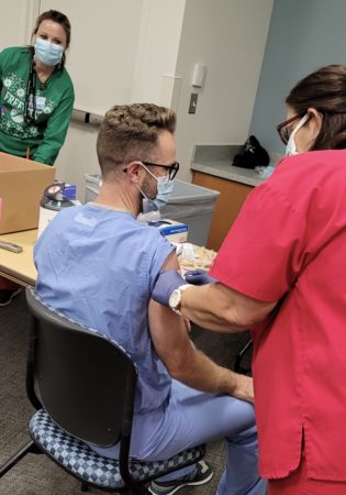 Freeman Health System giving COVID-19 shots to employees.