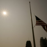 Missouri flag half staffed half staf