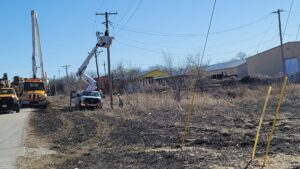 Downed powerline causes small grass fire – power outage