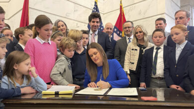 Photo of Arkansas Gov. Sanders signs bill creating school vouchers
