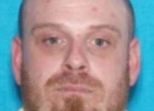 Photo of Missouri officer killed, 2nd hurt. Shooting suspect still at large as police search.